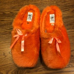 orange fluffy slippers
